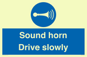 sound-horn-drive-slowly-warehousing-and-delivery-sign~